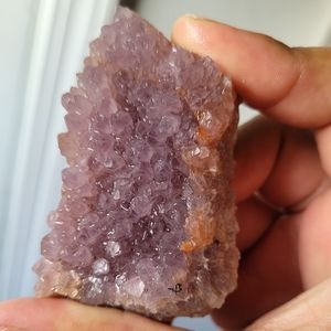 Amethyst with iron and orange crystal